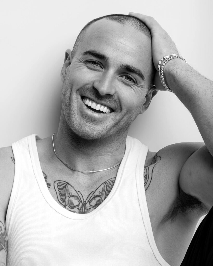 Davey Lloyd smiling, black and white