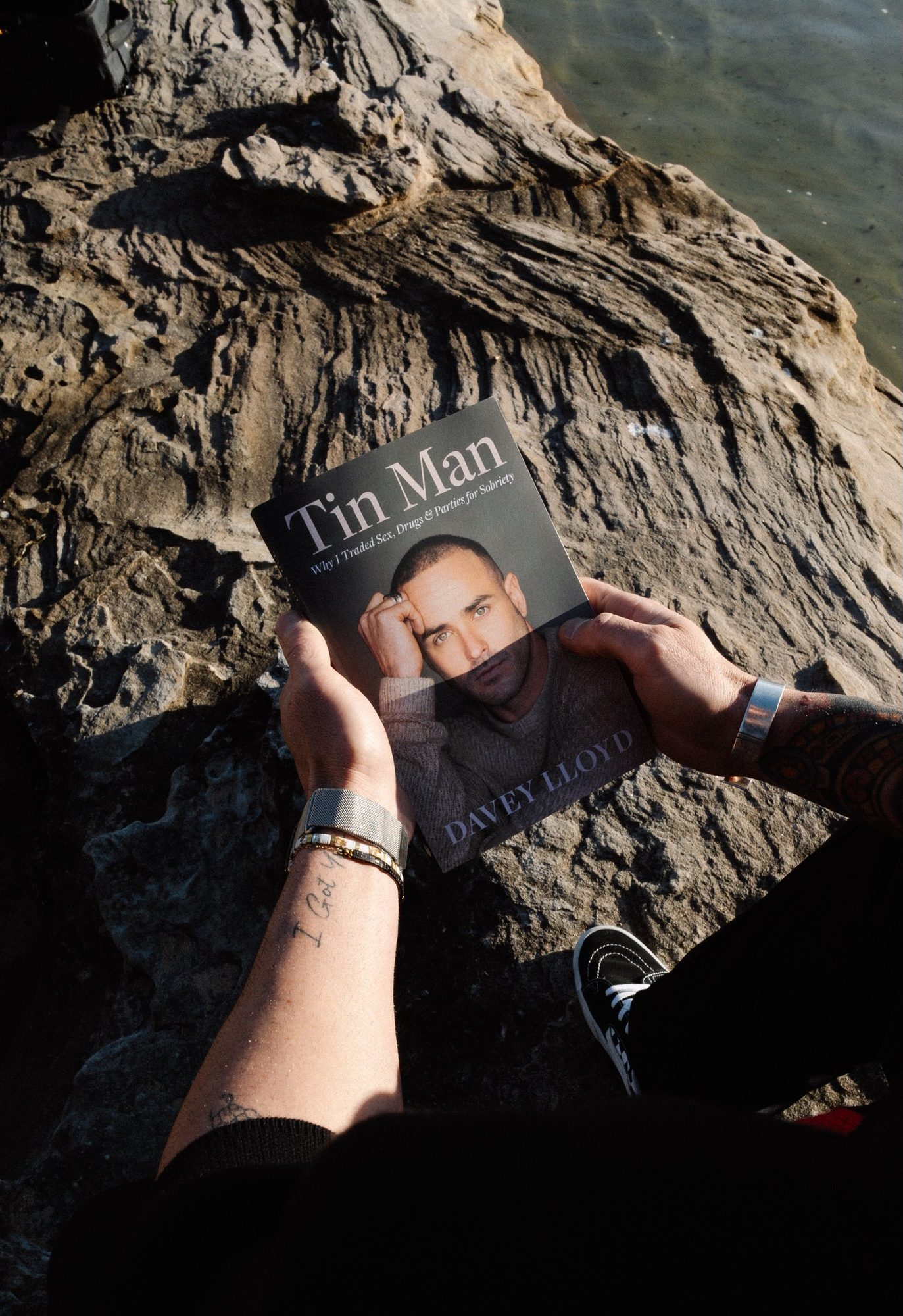 Tin Man book on the rocks by the ocean